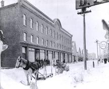Showing Holman&#039;s Store in winter, c. 1910; Wyatt Heritage Properties, Acc. 018.69