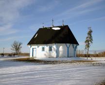 Primary elevation, from the south, of St. Elias Ukrainian Orthodox Church and Bell Tower, Sirko, 2006; Historic Resources Branch, Manitoba Culture, Heritage, Tourism and Sport, 2006