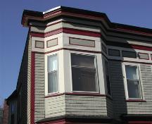This photograph shows the projecting cornice and the upper portion of the bay window, 2005; City of Saint John