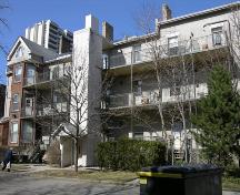 Rear elevation after conversion to condominium, showing new balconies and stairwell addition – 2006; OHT, 2006