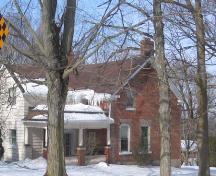 This photo features the handmade stretcher red-brick construction and two chimneys, 2007.; Lindsay Benjamin, 2007.