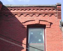 This photograph shows the brick design at the roofline, 2005; City of Saint John