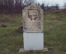 Showing detail of repaired MacKenzie stone; PEI Genealogical Society, 2006