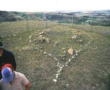 View of turtle effigy feature outlined with fieldstones, 1982.; Government of Saskatchewan, 1982.