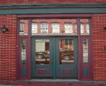 This photograph shows the paired doors and transom window and sidelights in the entrance, 2005; City of Saint John