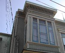 This photograph shows the cornice and the upper portion of the bay window, 2005; City of Saint John