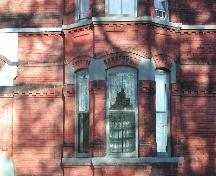 This photograph shows the first storey section of the bay window, 2005; City of Saint John
