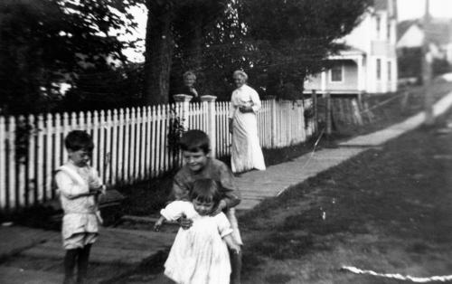 Street scene with house in background, c. 1905