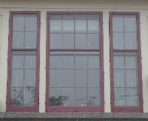 This image provides a view of the triple windows with multiple panes on the main floor, 2005; City of Saint John