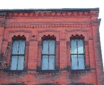 This photograph shows the roof-line and the detailed openings, 2005; City of Saint John