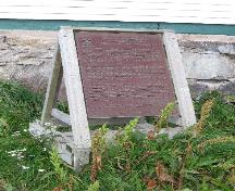 Detail view of the plaque at Hopedale Mission, 2007.; Parks Canada Agency / Agence Parcs Canada, David Henderson, 2007.
