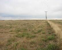 View southeast across site area, currently a hay field, 2007.; Government of Saskatchewan, Marvin Thomas, 2007.