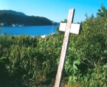 Photo showing the cross at the Captain Coubelongue Grave Site, Conche, NL, circa 2000; Courtesy C. Cochrane, 2008