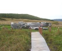 Photo of 1942 Plane Crash Municipal Heritage Site, showing plan wreck, Conche, NL, 2004; Courtesy of French Shore Historical Society, 2008