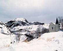 View of Christ Church / Quidi Vidi Church, showing its location on a steep hill overlooking the harbour, 1994.; Parks Canada Agency / Agence Parcs Canada, J. Butterill, 1994.