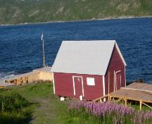Photo showing front and side of Casey Store, Conche, NL. Photo taken August 5, 2004.; FSHS/HFNL, 2008