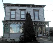 This photograph provides a contextual view of the building on Douglas Avenue, 2006; City of Saint John
