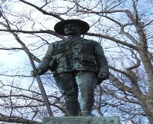 This photograph shows a statue of a Boer War soldier in a resting position with his rifle, 2006; City of Saint John