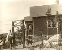 Photo of Captain Olaf Olsen and house, showing a portion of the front facade with side porch at Fjordheim, Holyrood, circa 1940; Courtesy Brendan Hunt, Tea Garden Restaurant, 2008