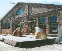 East façade of Building 9 of the Former Shawinigan Aluminum Smelting Complex, 2001.; Parks Canada Agency / Agence Parcs Canada, Jacques Pleau & Michel Pelletier, 2001.