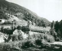 General view of the Doukhobor Suspension Bridge, 1994.; Agence Parcs Canada/Parks Canada Agency,  1994.