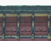 This photograph shows the bracketed roof-line cornice, the dentils and the detailed frieze, 2005; City of Saint John