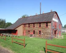 Side elevation including opening for log carriage, Sutherland Steam Mill Museum, Denmark, NS, August, 2008.; Dept. of Tourism, Culture and Heritage, Province of Nova Scotia, 2008