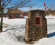 This image shows the placement of the monument adjacent to the former Minto Railway Station, 2009; Village of Minto