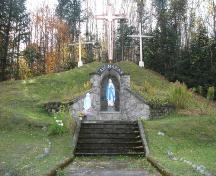 Photo of the grotto when the site had three crosses, two of which were removed in 2008; Madawaska Planning Commission