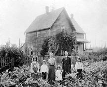 Martha Love and children in front of Love House, Cumberland Road, circa 1907.; Burnaby Historical Society, Community Archives, BHS-21.1