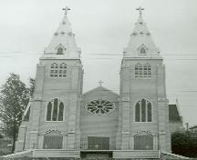 View of Saint Paul's Roman Catholic Church, showing its twin 26-metre-high ornate spires projecting from the front elevation.; Parks Canada Agency / Agence Parcs Canada.