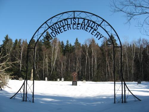 Showing metal entrance gate with sign