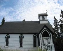 Side elevation showing main entrance, which faces the water,  St. John Evangelist Anglican Church, Bell Island, LaHave Islands, Lunenburg County, Nova Scotia, 2006.; Heritage Division, Nova Scotia Department of Tourism, Culture and Heritage, 2006