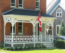 This image shows the elaborate details of the veranda; City of Fredericton
