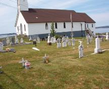Topsail United Church Cemetery, 2424 Conception Bay Highway, Topsail, Conception Bay South, with Topsail United Church in background, July 2004.; Heritage Foundation of Newfoundland and Labrador 2005