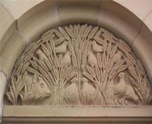 Showing detail of carving above entrance; MacNaught History Centre and Archives, Natalie Griffith, 2005