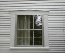 This photograph shows one of the wood framed windows, 2007; Town of St. Andrews