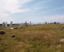 All Saints Anglican Cemetery #1, view from crest of hill, overlooking Conception Bay, July 2004; Heritage Foundation of Newfoundland and Labrador, 2005
