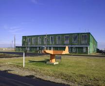 Contextual view, from the west, of the Commonwealth Air Training Plan Hangar, Brandon area, 2005; Historic Resources Branch, Manitoba Culture, Heritage, Tourism and Sport, 2005