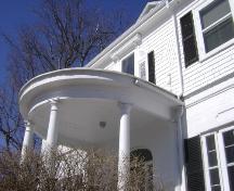 This photograph illustrates the rounded porch, 2008; Town of St. Andrews, 2008