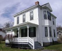 This photograph shows the contextual view of the Charles Horsnell House, 2008; Town of St. Andrews