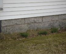 This photograph illustrates the foundation stones that were cut and laid by the original occupant, 2008; Town of St. Andrews