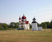Contextual view, from the west, of the Ukrainian Catholic Church of the Immaculate Conception, Winnipegosis, 2006; Historic Resources Branch, Manitoba Culture, Heritage and Tourism, 2006