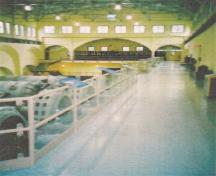 View of the station's interior at Stave Falls Hydro-Electric Installation, showing its open space and mezzanine gallery, 2002.; Agence Parcs Canada / Parks Canada Agency, 2002.