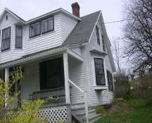 This photograph shows the side façade of the residence and illustrates the triangular bay window, 2009; Town of St. Andrews