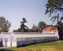 General view of the greenhouses at the Central Experimental Farm, 1995.; Parks Canada Agency / Agence Parcs Canada, 1995.