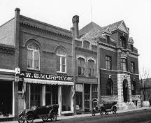 Archival view, from the southeast, of the Murphy Block (left), Carberry, ca. 1925; Carberry Plains Archives, ca. 1925