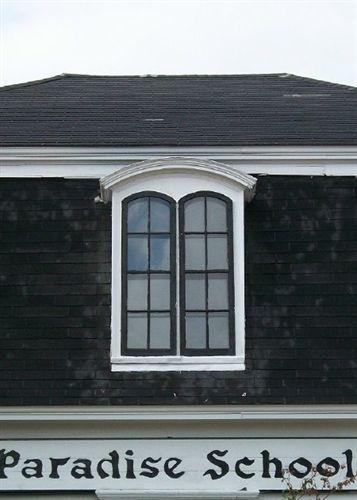 Segmented Dormer with Paired Round-Headed Window