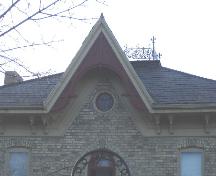 Featured are the decorative brackets and frieze adorning the gable.; Kayla Jonas, 2007.