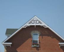 Featured is the gable roof and decorative verge board.; Beatrice Tam, 2008.
